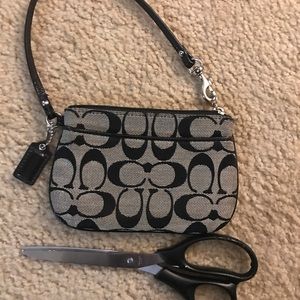 Coach wristlet, tan and black signature jacquard.